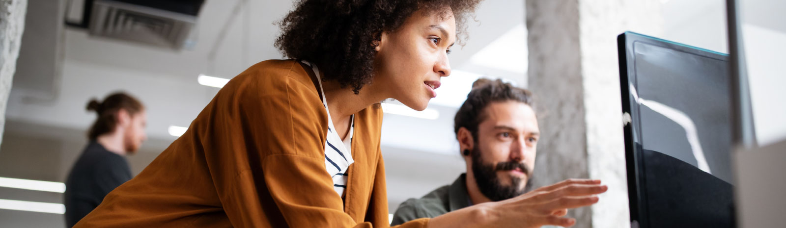 two people working on computer